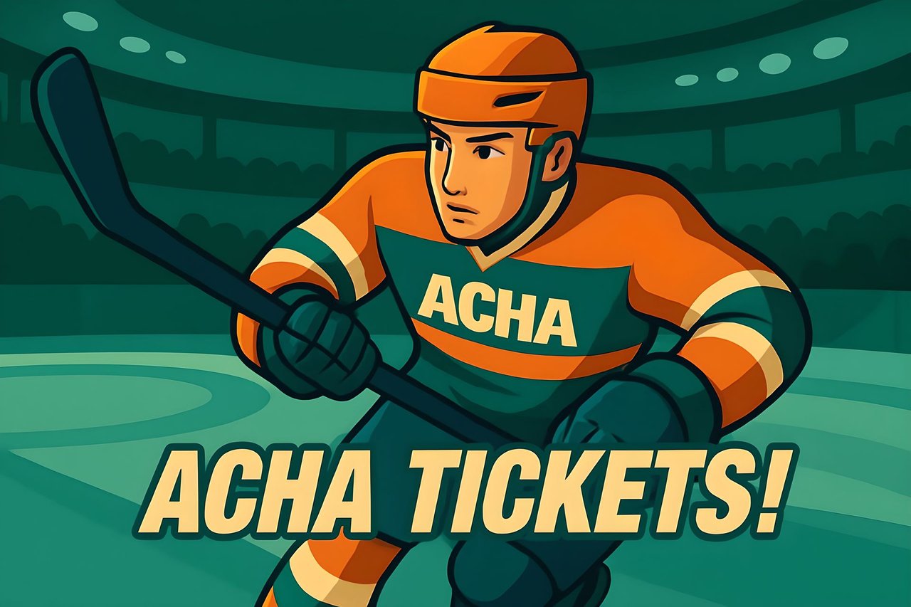 A hockey player in a white uniform swings his hockey stick to score